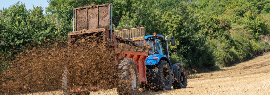 Image of Muck spreading farm tractor